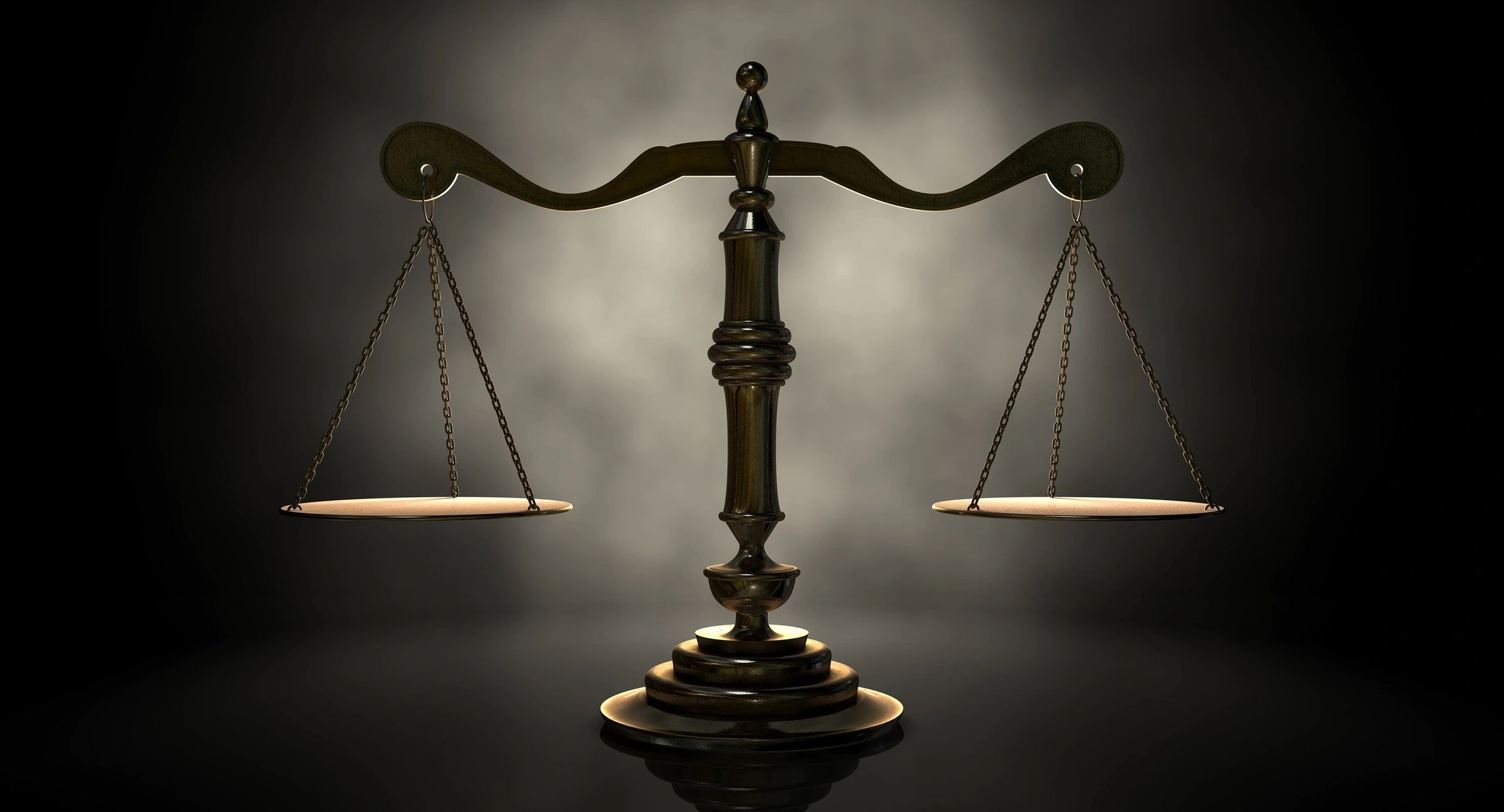 A bronze balance scale with evenly balanced pans, set against a dark, smoky background, symbolizing justice, fairness, and equilibrium.