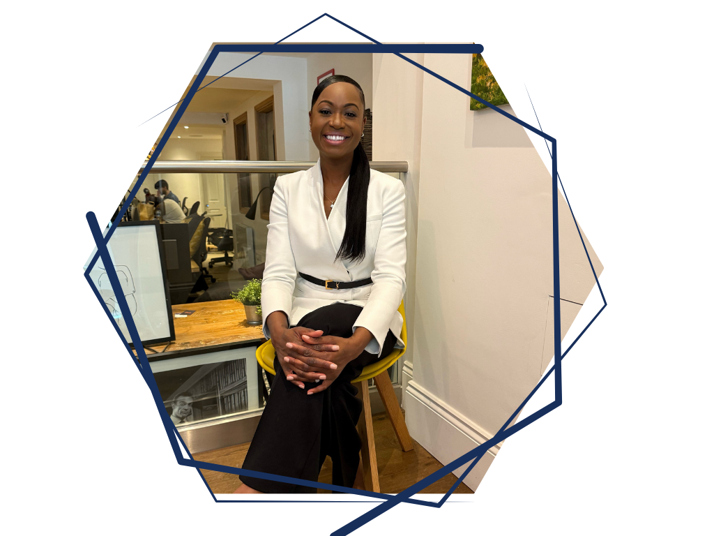 Professional portrait of a researcher in a modern office environment, connected to work on AI and behaviour change at work.